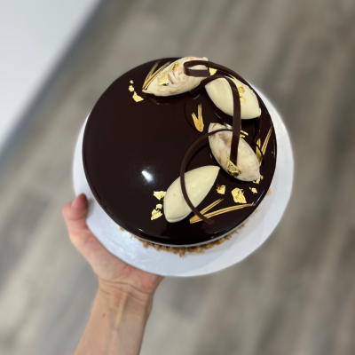 Chocolate, salted caramel and praline mousse cake